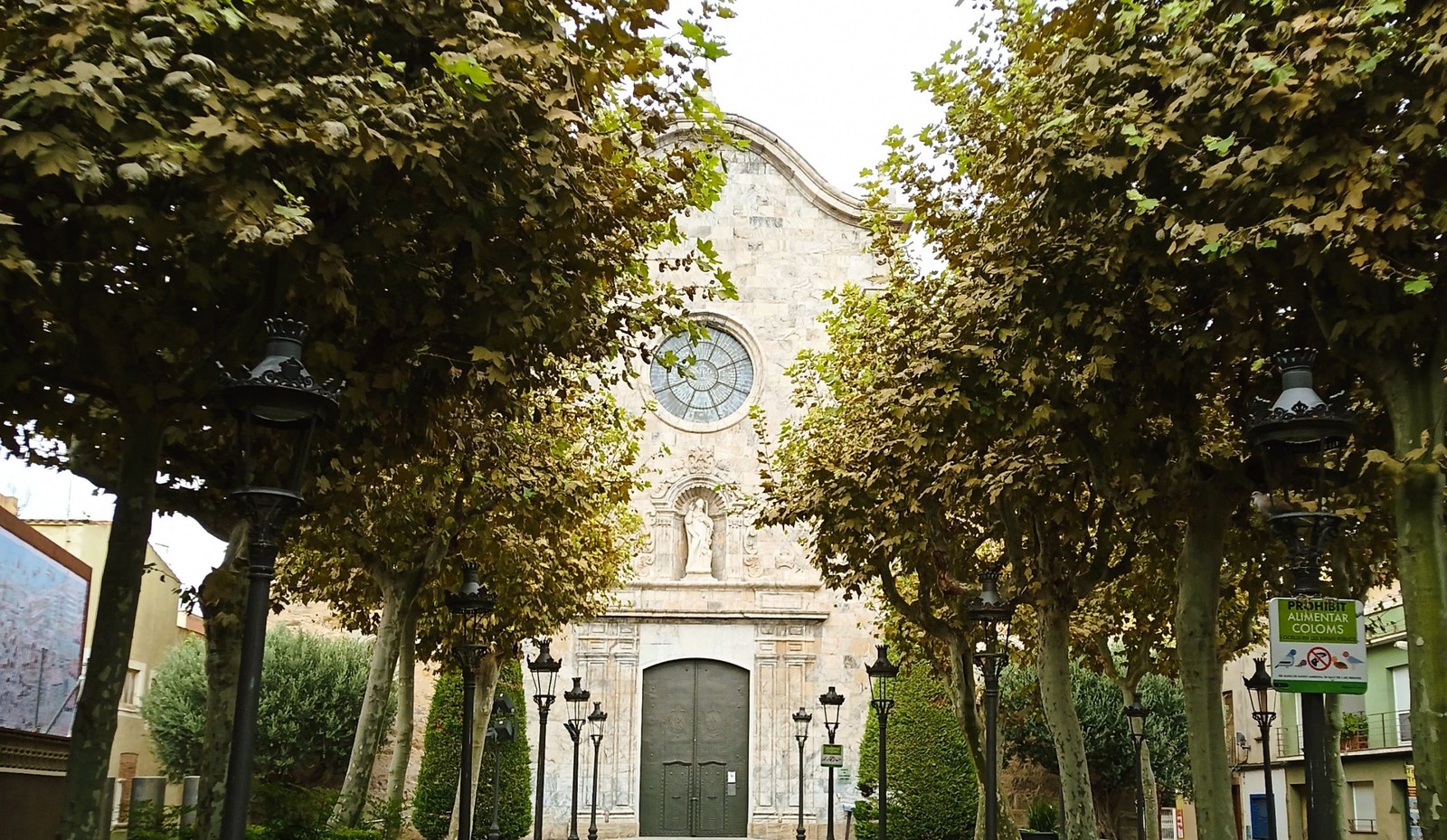Church of Sant Nicolau and an avenue of plane trees in the centre of Malgrat