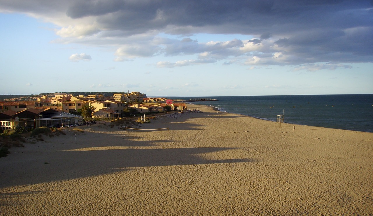 The sandy beach at Leucate at sunset and the streets by the sea