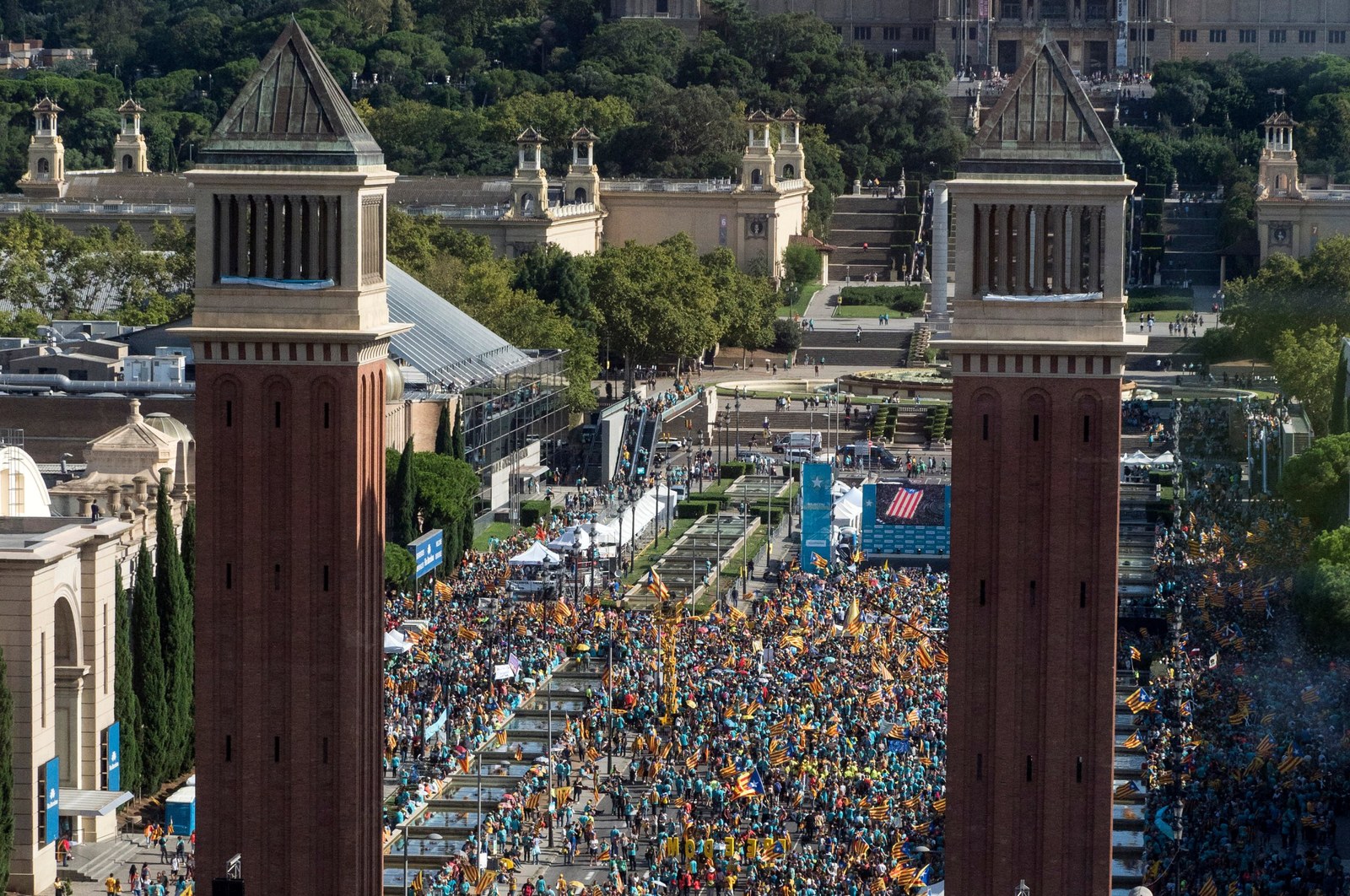 Crowds with flags on Placa d'Espanya in Barcelona on La Diada